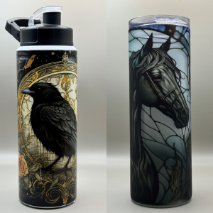 A metal water bottle with a raven on the front and a tall tumbler with a black horse on the front