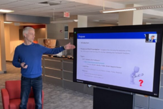 IT associate director, Sascha Mangs, presenting to the NGN team