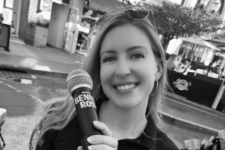 Rob's daughter with a microphone in hand