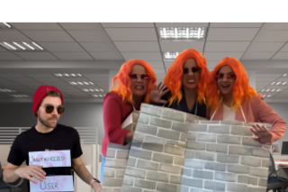 3 people wearing a piece of wall and fire orange wigs and 1 person wearing sunglasses and a beanie