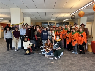 IT employees dressed in Halloween costumes